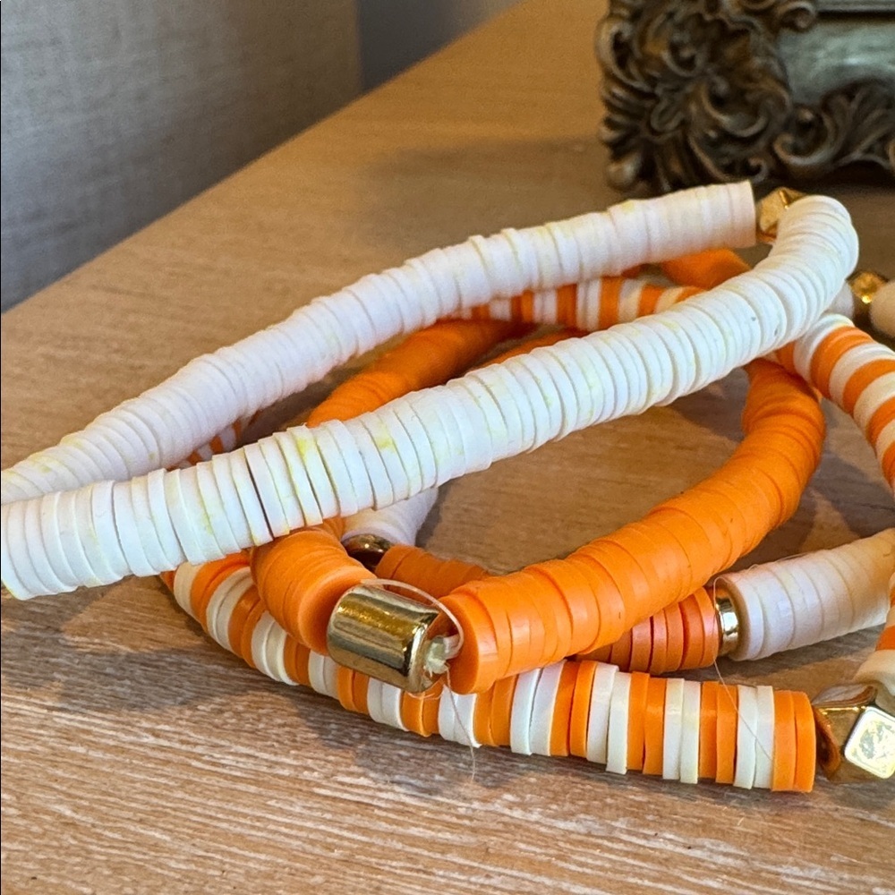 Set of 4 Orange and White Stretchy Bracelets with Gold Accents - Picture 3 of 3